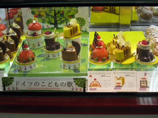 A shelf of small cakes